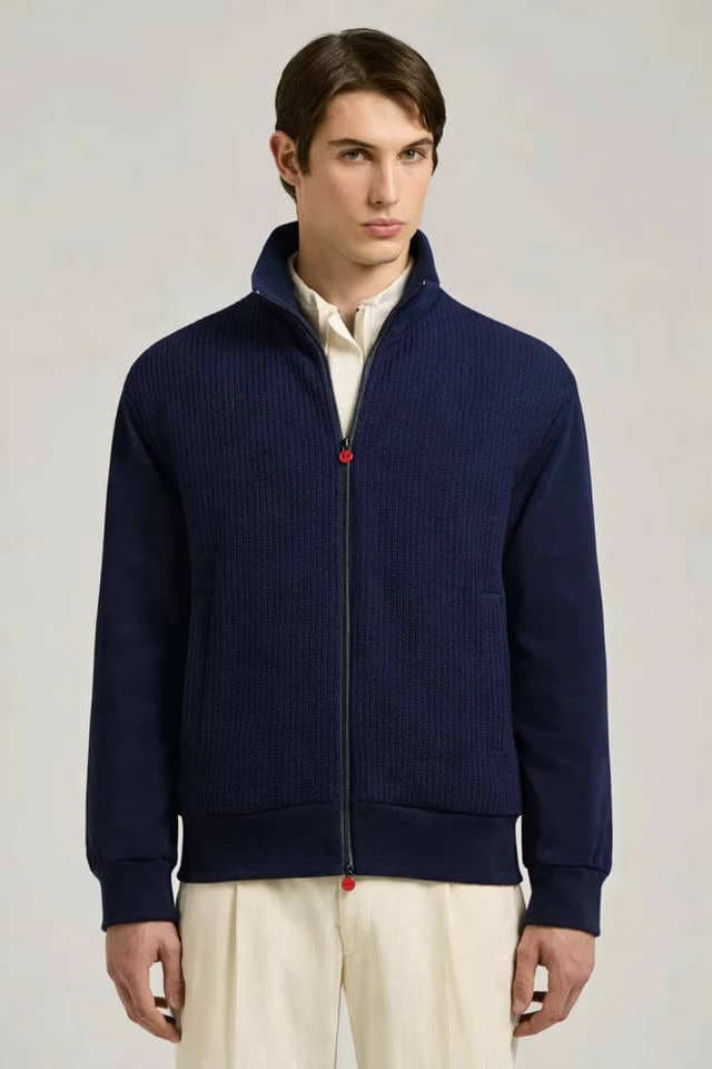 Knit bomber jacket with woven sleeves shown across its colourway range and construction detail