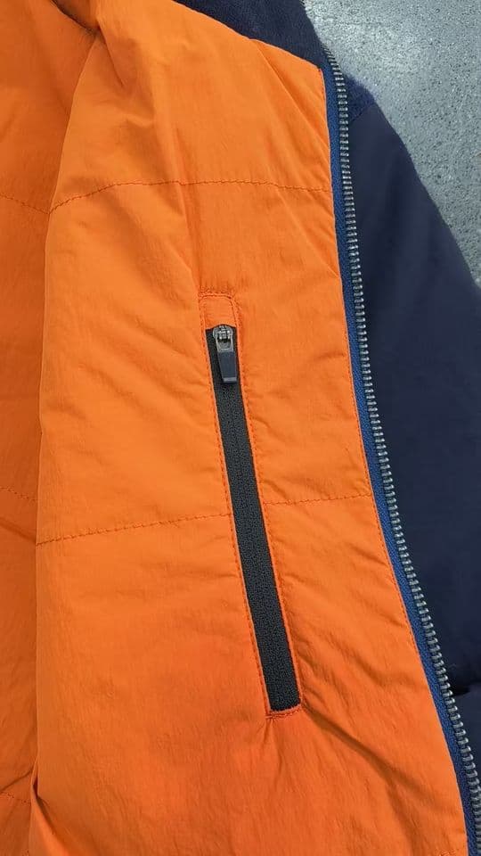 Knit bomber jacket with woven sleeves shown across its colourway range and construction detail