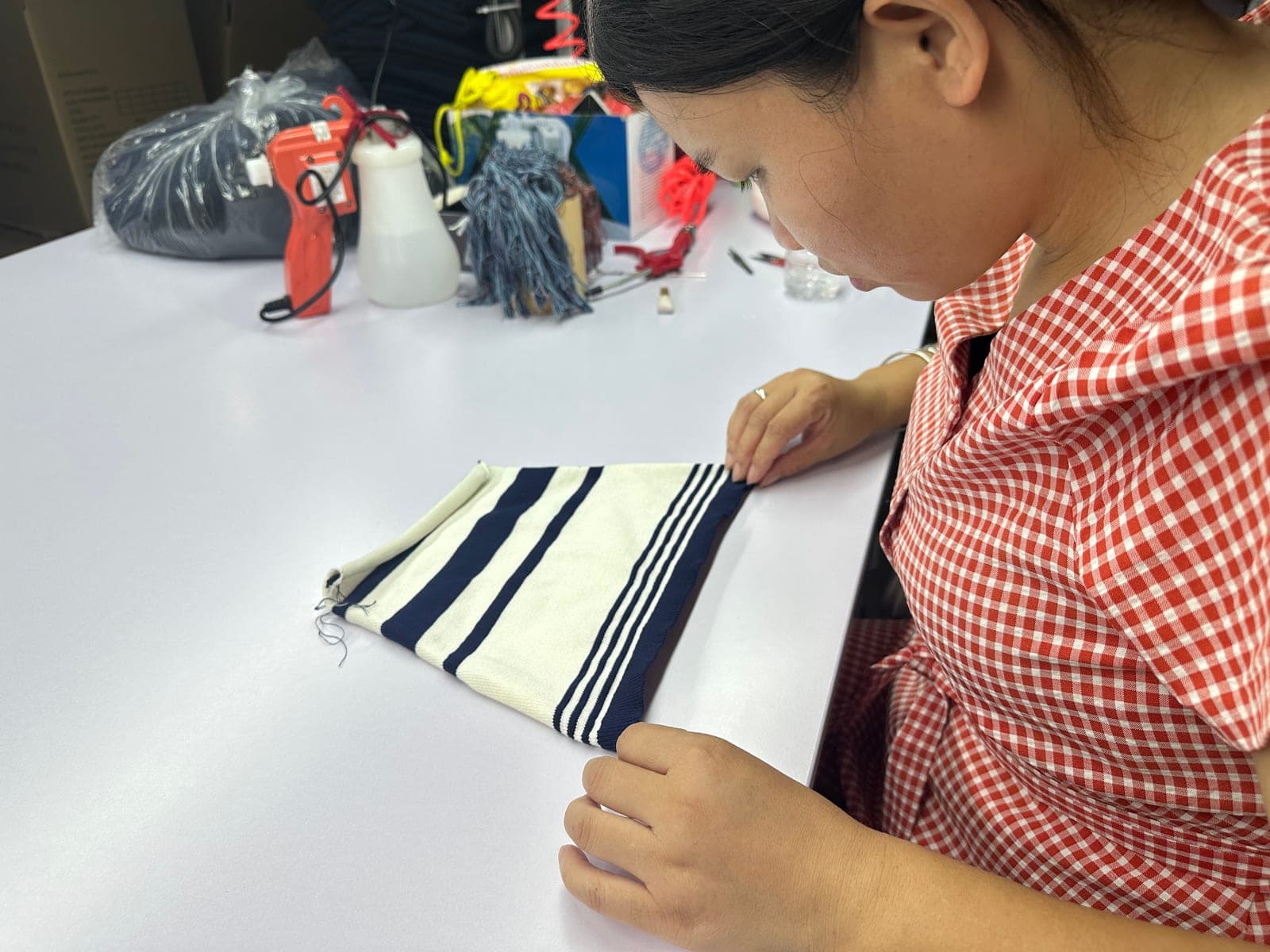 Inspecting a striped knit panel during quality control