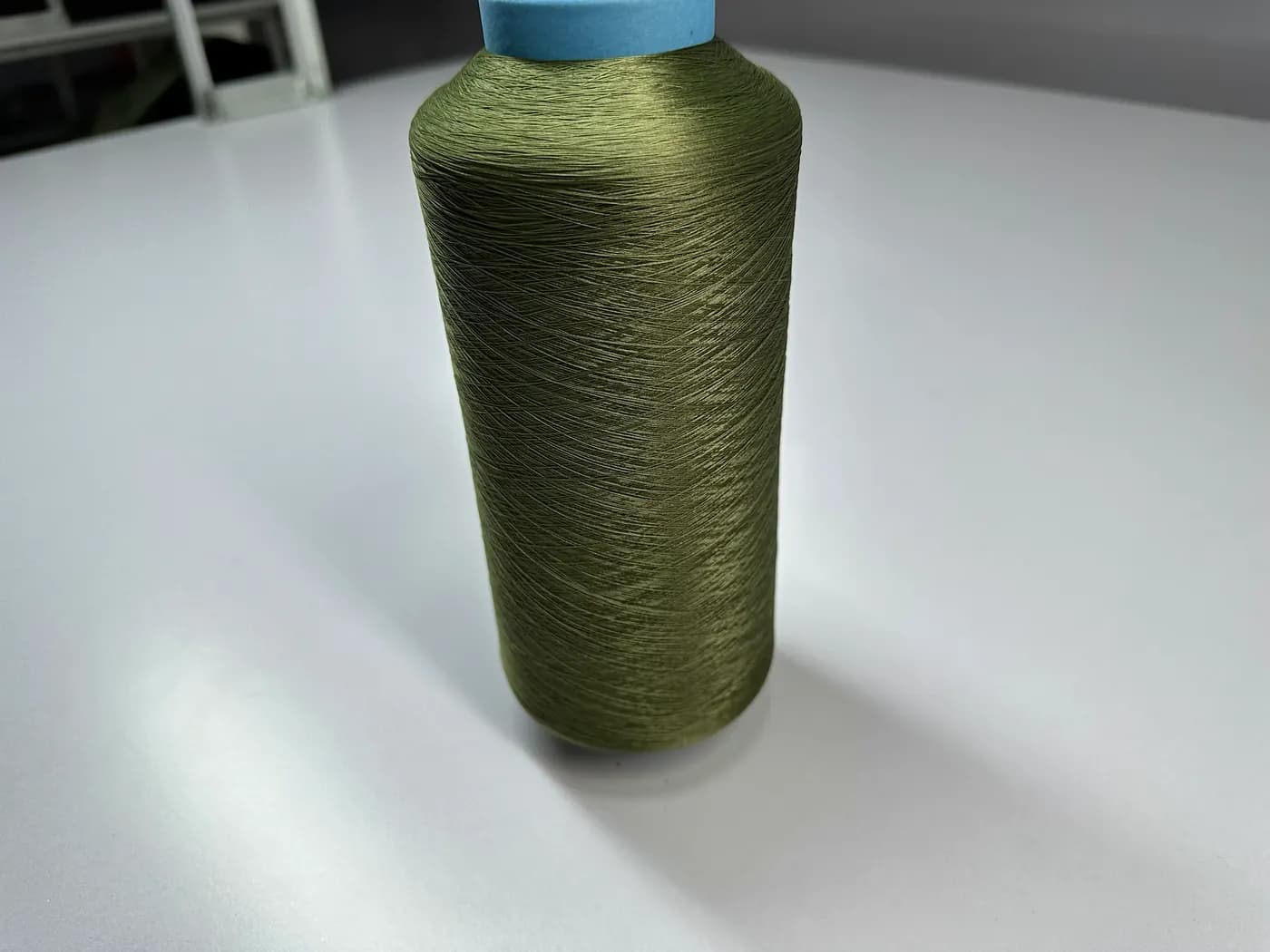 Close-up of knitwear yarn on cones
