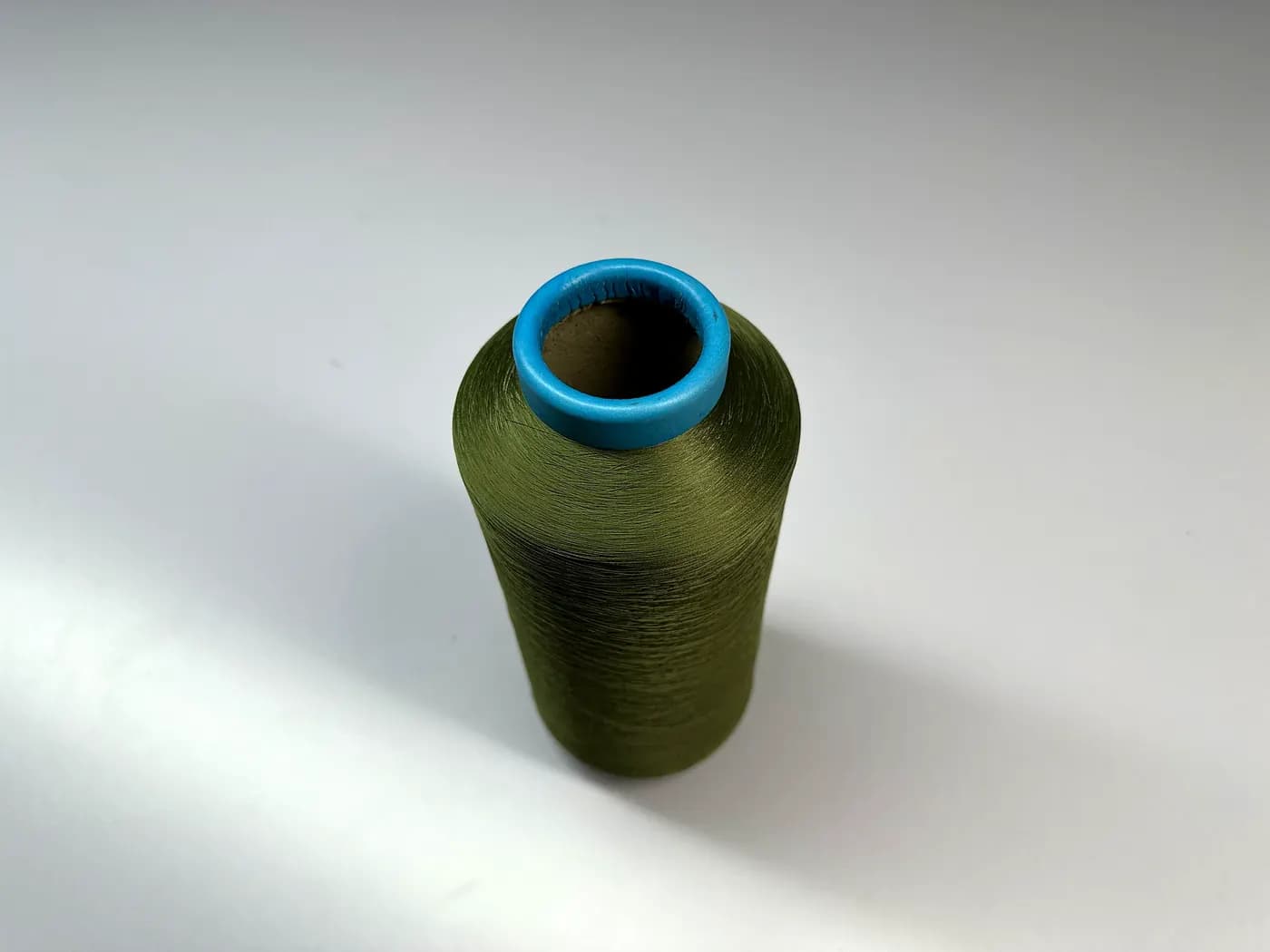 Close-up of knitwear yarn on cones