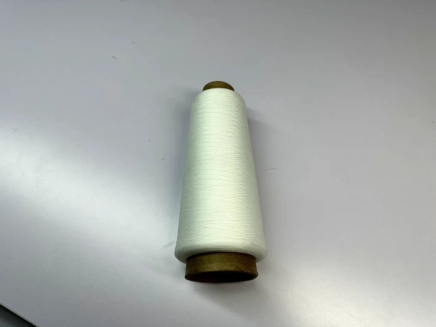 Close-up of knitwear yarn on cones