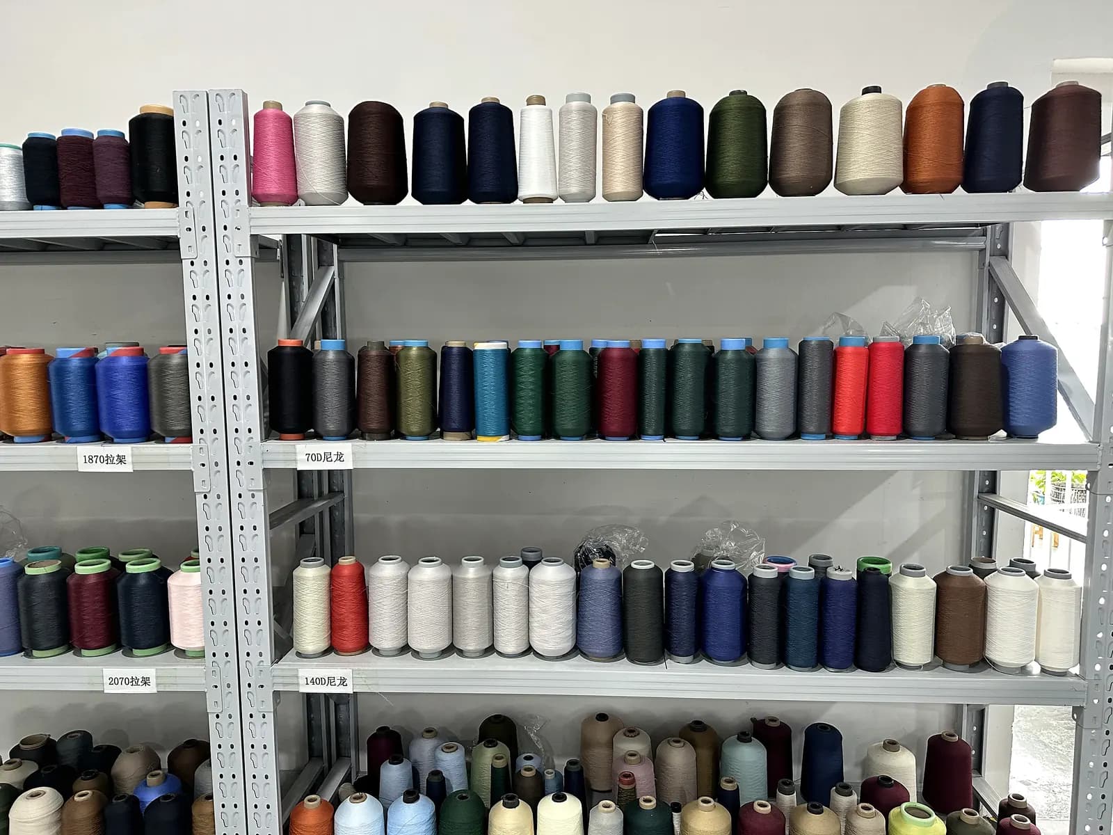 Yarn store with racked cones held for production