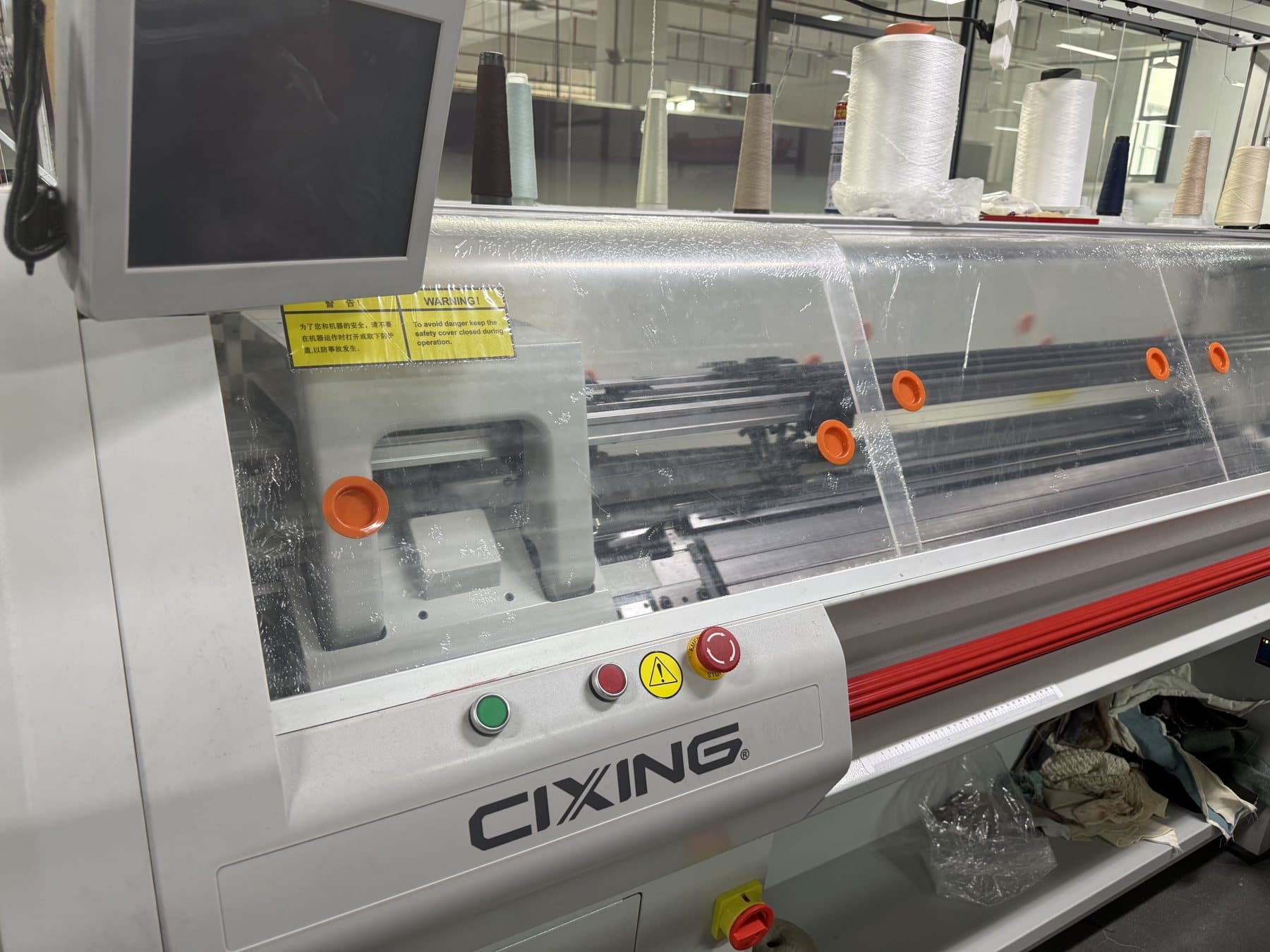 Cixing computerised flat knitting machine on the Licheng knitting floor