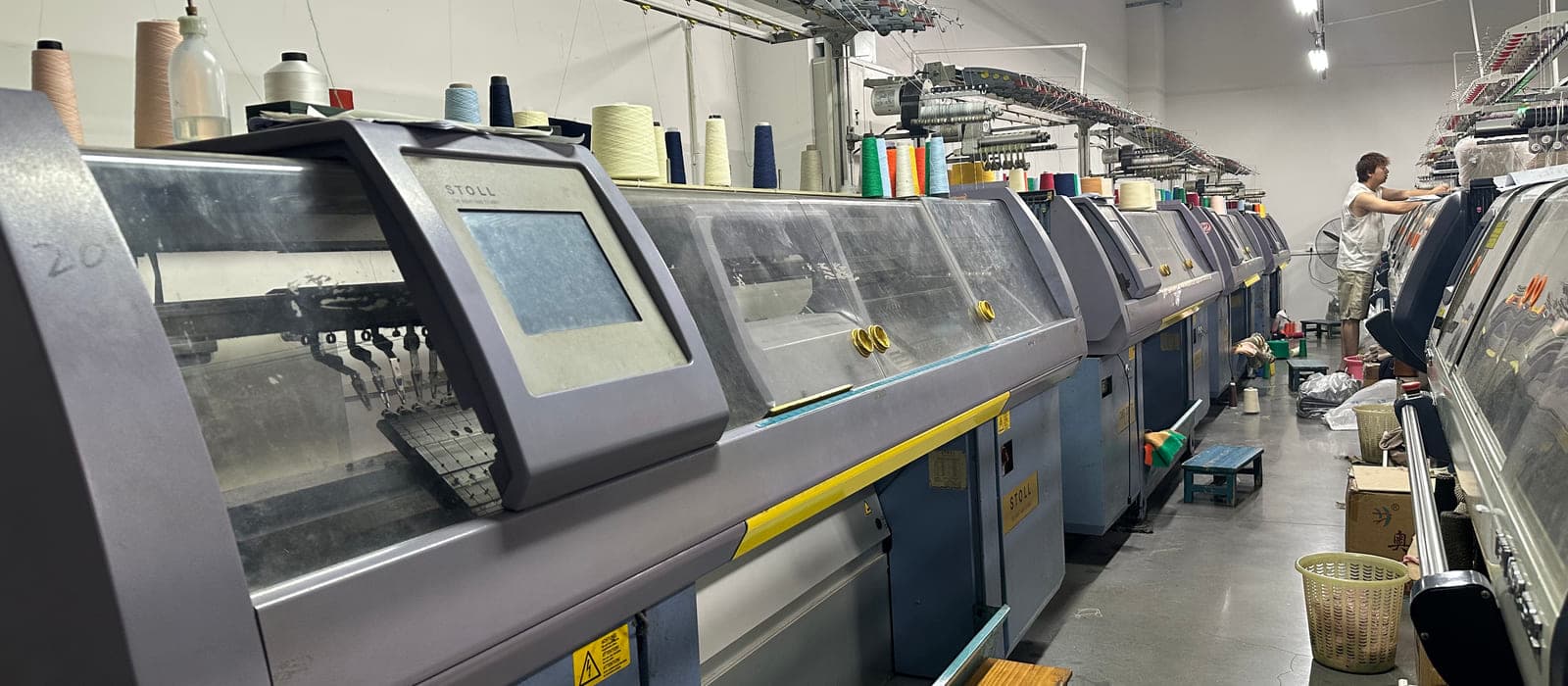 Yarn materials and STOLL machines at Licheng Knitwear