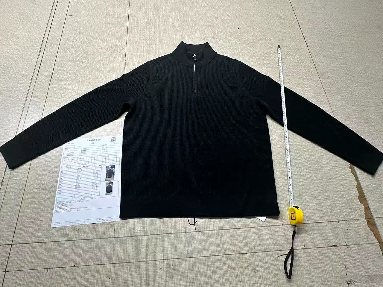 Technical specification sheet with sample and measuring tape.