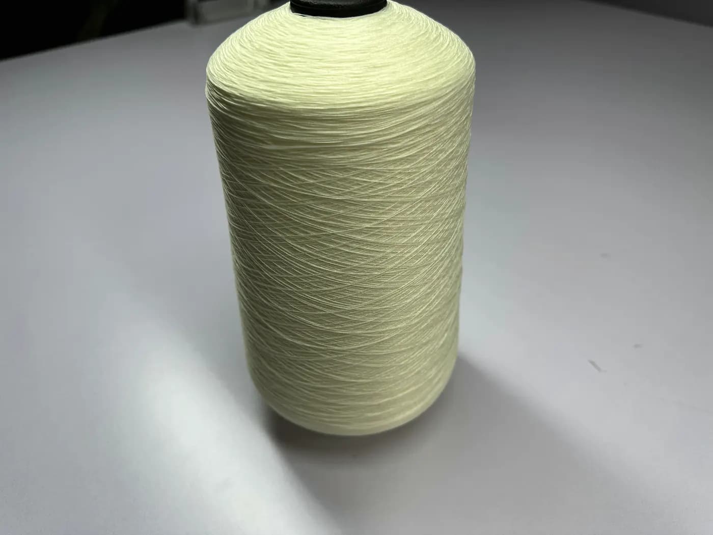 Close-up of knitwear yarn on cones