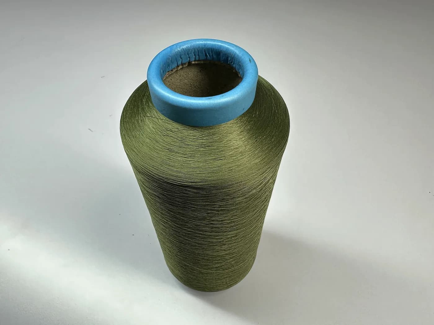 Close-up of knitwear yarn on cones