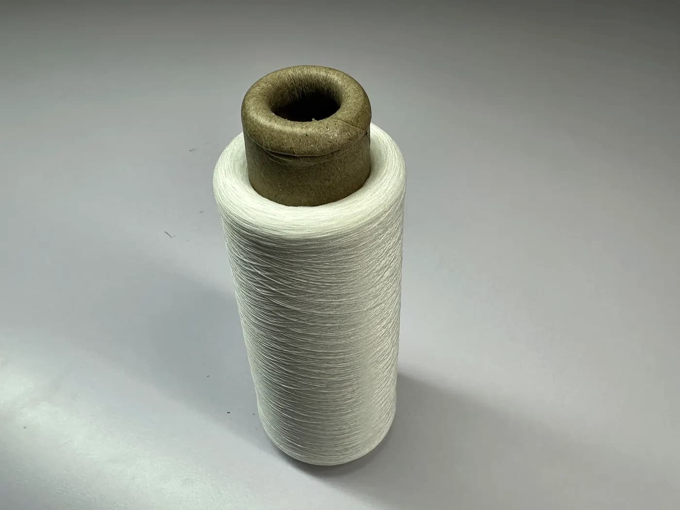 Close-up of knitwear yarn on cones