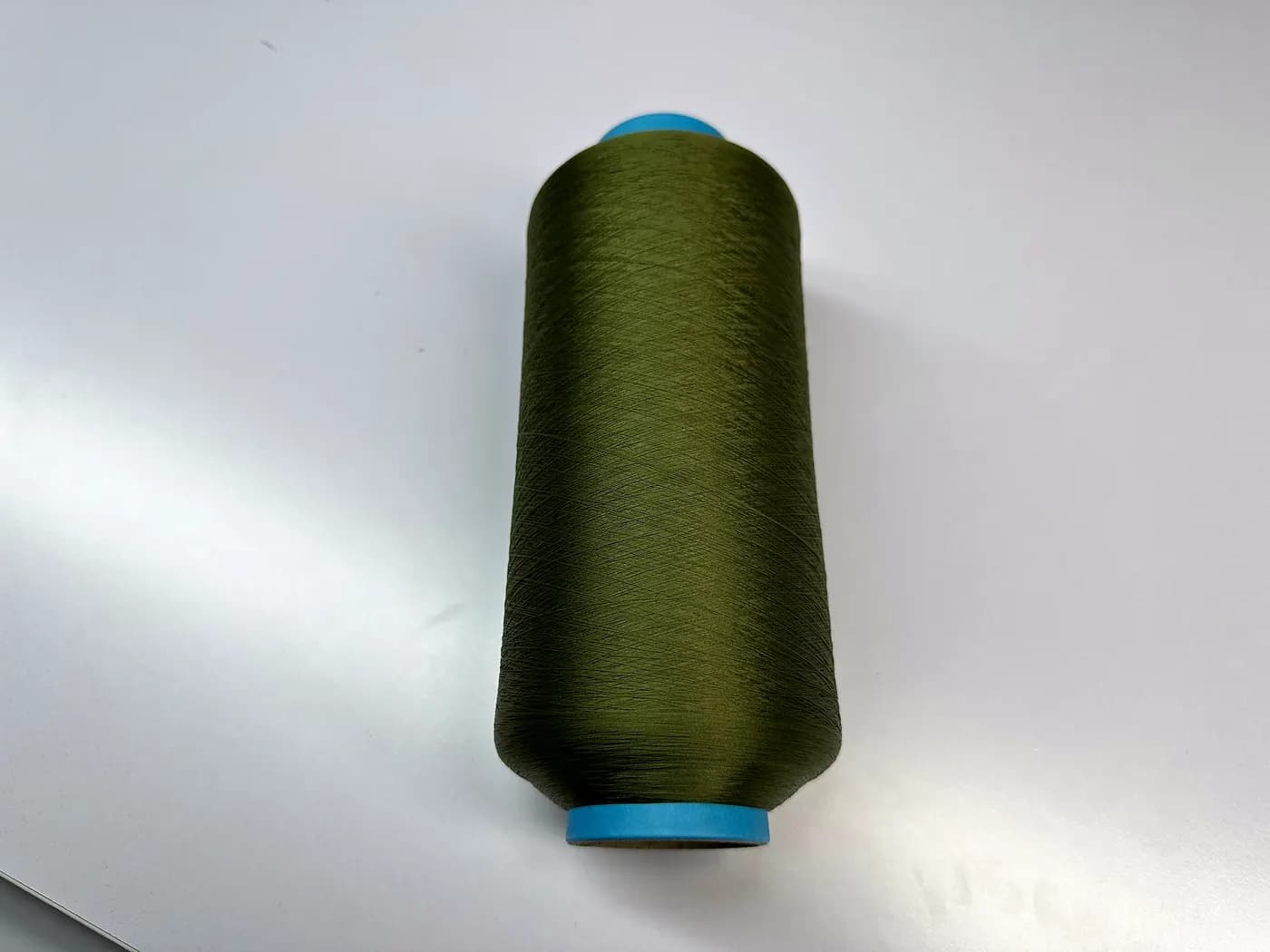 Close-up of knitwear yarn on cones