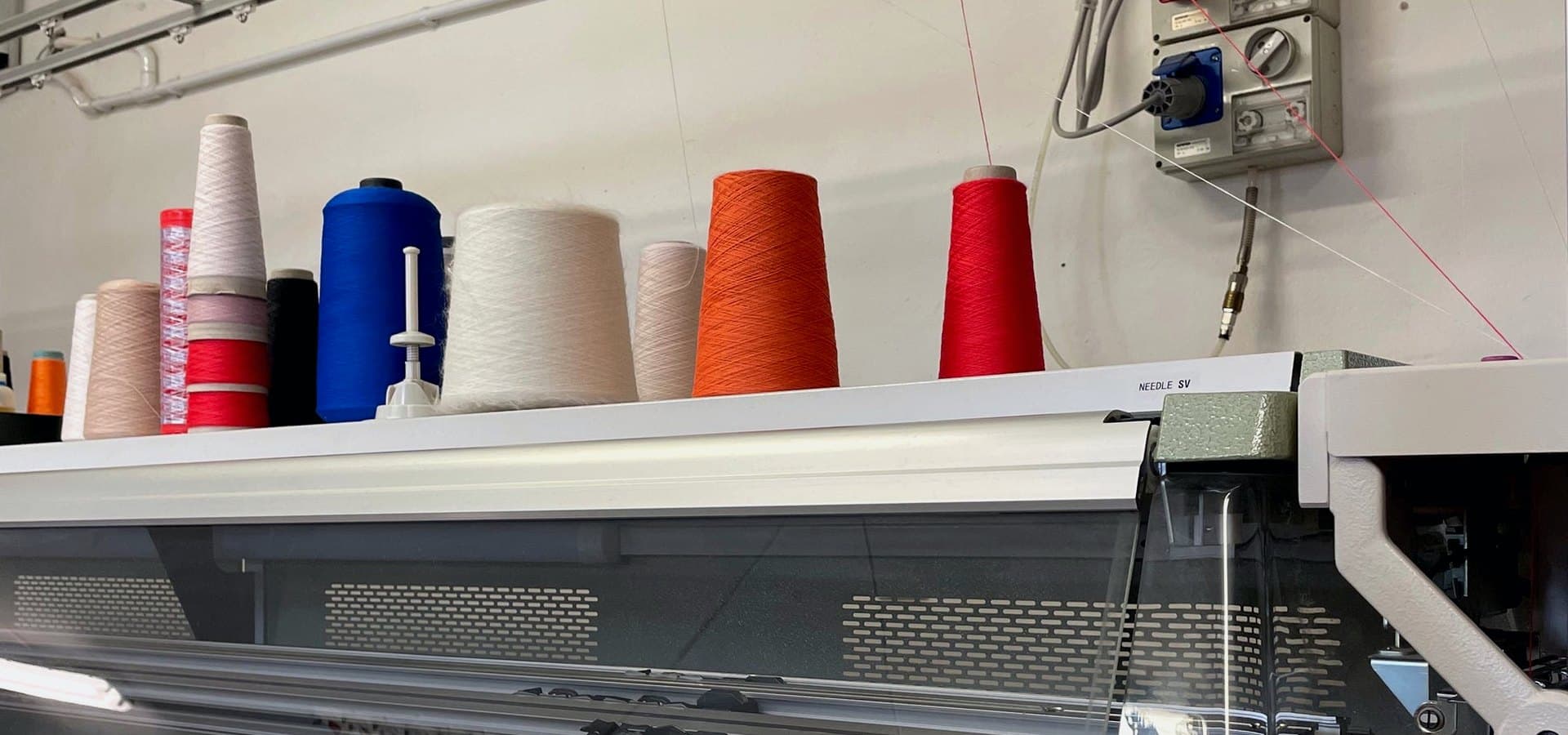 Custom knitwear development — yarn, trims and finishing